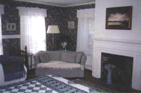 Corner room overlooking the tidal creek and Main Street, Wellfleet, MA,  second floor, one Queen Bed and Private Bath, Room 21-Cape Cod photo