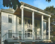 Inn at Duck Creeke-back porch facing pond and Saltworks House -  InnatDuckCreeke.com