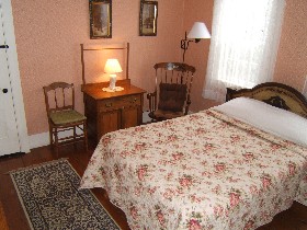 Wellfleet Inn. Room 29, second floor with One Queen Bed shares a bath with Room 30.
